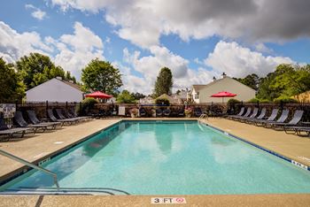 Resort-style swimming pool with sundeck